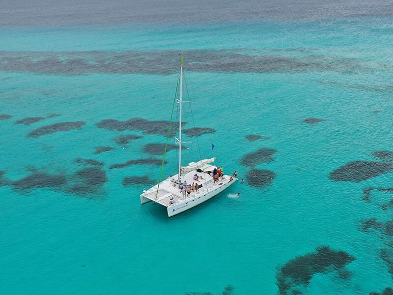 Catamaran on Isla Mujeres turquoise blue waters