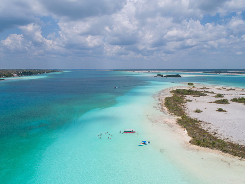 Enjoy your time floating and swimming in the Bacalar 7 Colors Lagoon