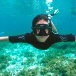 Jump in crystal clear waters and snorkel while having fish around you. Enjoy the amazing view of the colourful reef in the Sail Cat 30 Guests private tour to Isla Mujeres